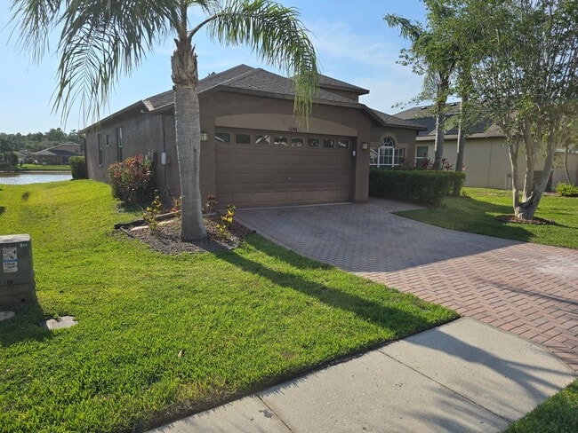 Building Photo - Waterfront View! 4 bed 2 bath 2 car garage