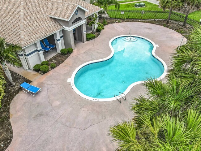 Building Photo - Island Cove Villas at Meadow Woods 1-Story...