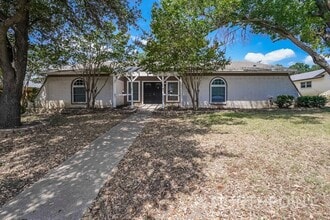Building Photo - 4 BR/3BA | Updated Single Family Home | 2-Car Garage Parking | In Bedford!