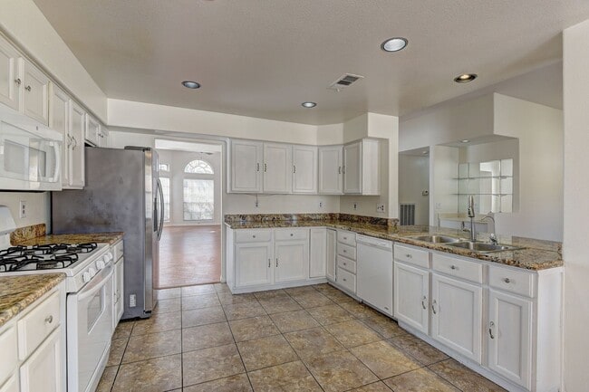 Building Photo - AMERICANA Property Mgmt - Great 2 story, 4 beds house with pool in Desert Shores