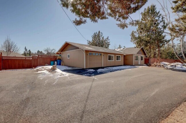 Building Photo - 1/2 acre in the with RV Hook ups