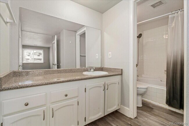 Building Photo - "Charming 2-Bed Condo with Cozy Fireplace in Prime Arvada Location!"