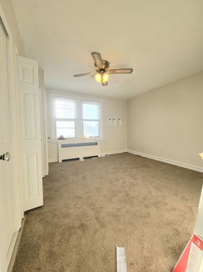 Building Photo - Stunning 4-Bedroom Townhome with Finished ...