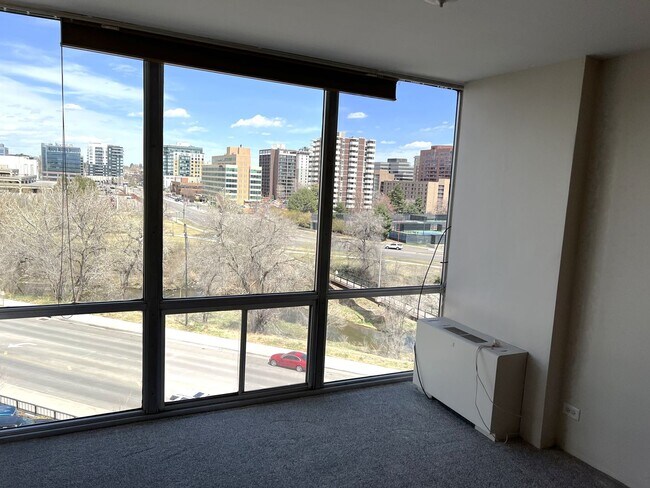 Building Photo - Corner Condo with Stunning Views in Cherry...