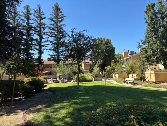 Building Photo - Completely remodeled and updated condo close to Fresno State and shopping. *Ask about the Move-in...