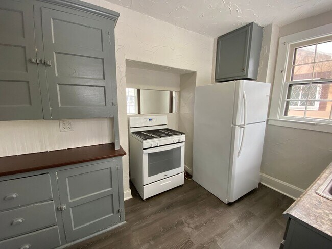 Building Photo - Cozy Akron Home w/ Fireplace Charm, Detached Garage & Back Porch