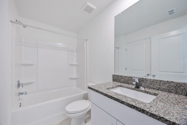 Building Photo - Brand New End Unit Townhome in Angeline Co...