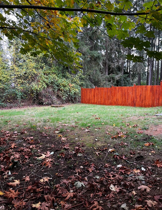 Building Photo - 2 Story Duplex Available. HUGE, FENCED YAR...