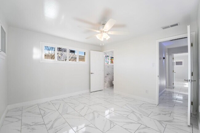 Building Photo - Single Story,  Totally Renovated , 3 bedroom, 2 bathroom Home with  extensive privacy and gated h...