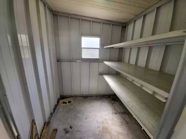 STORAGE SHED WITH SHELVES - 6710 Ballad Ln