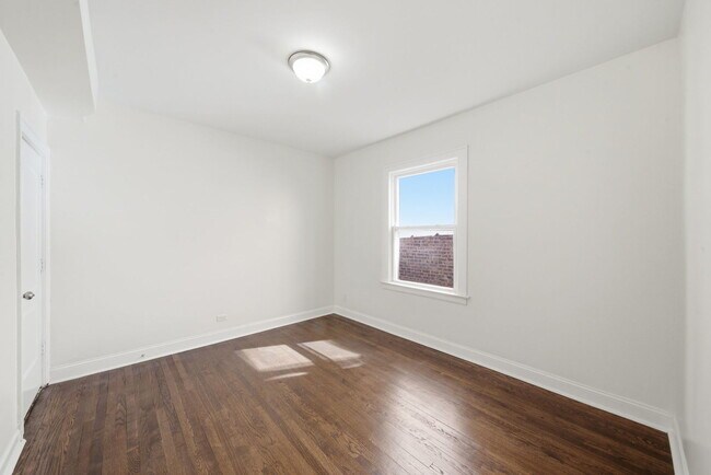 Building Photo - 8024 S Vernon Ave