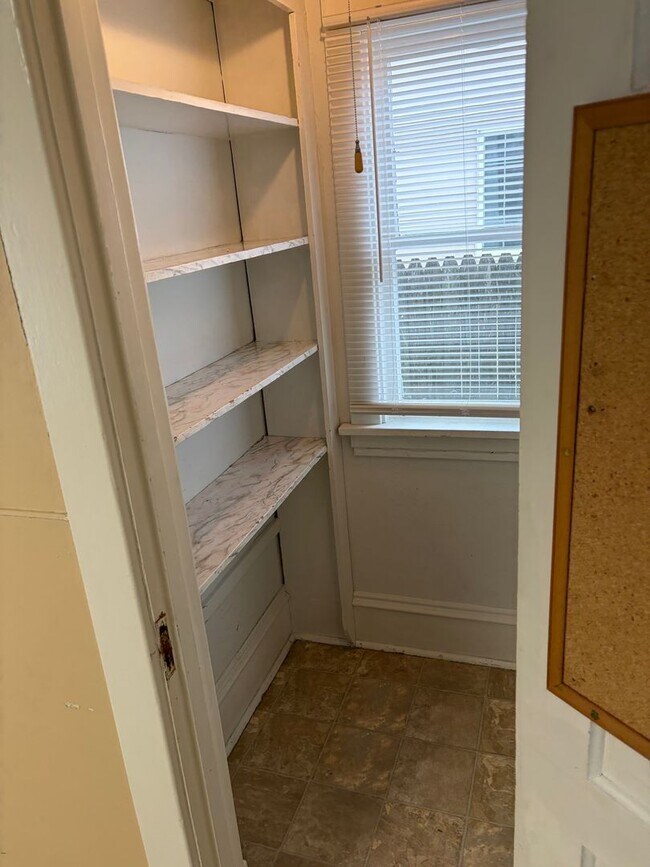 Building Photo - Charming 2-Bedroom, 1.5-Bath with Garage & Fenced Yard