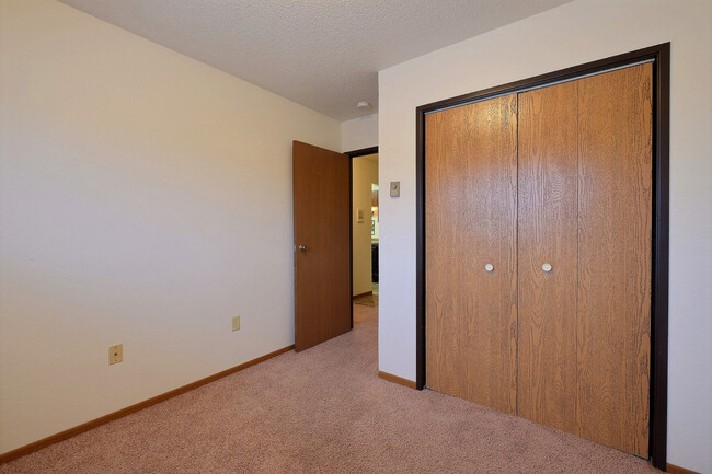 Fargo, ND Village West Apartments | Bedroom - Village West