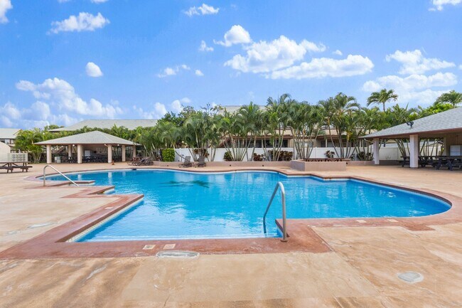 Building Photo - Island Living Meets Modern Luxury in Gated Palm Court
