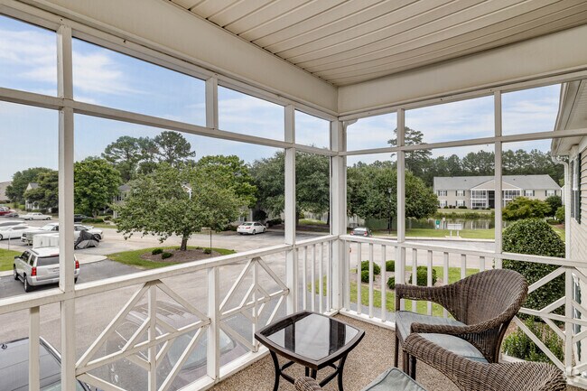 Screened porch. - Chandler Terrace Temporary Housing