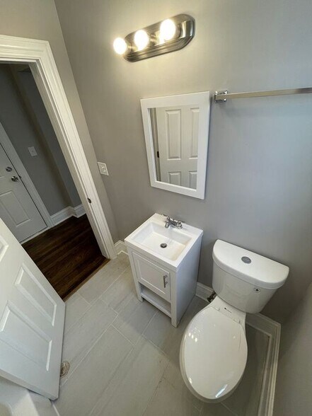 Building Photo - 11021 S Vernon Ave