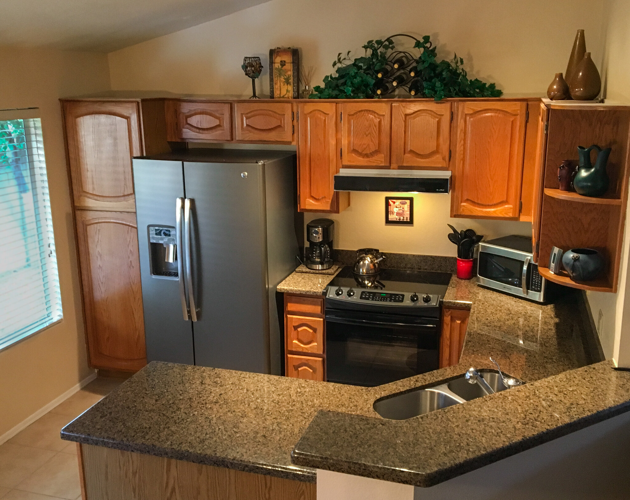 Fully stocked kitchen - 9257 E Sutton Dr