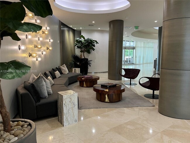 Building Photo - 10275 Collins Ave