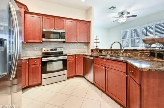 Building Photo - Lakefront 3 Bed + Den 2 bath home with pool and spa tub in Waterways of Naples Community