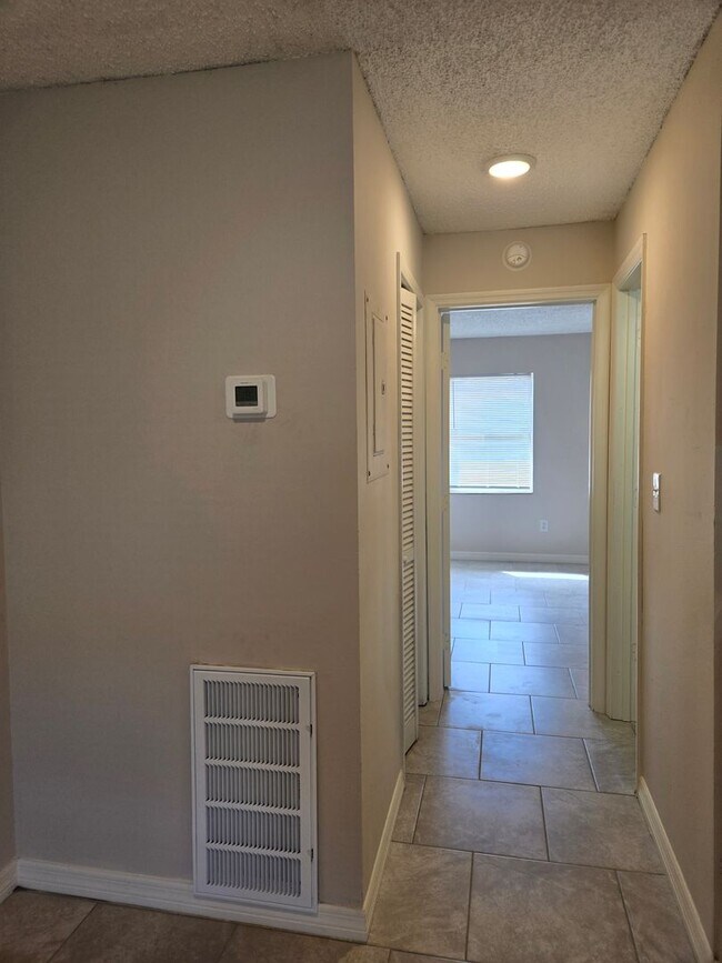 Building Photo - 1300-1306 Melody Ln