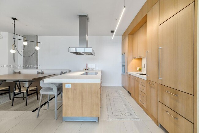 Building Photo - 10205 Collins Ave