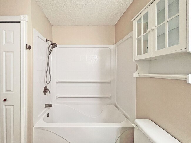 Building Photo - Beautifully Redone Modern Townhome with Large Deck, 2-Car Garage, Granite Kitchen, Vaulted Ceilin...