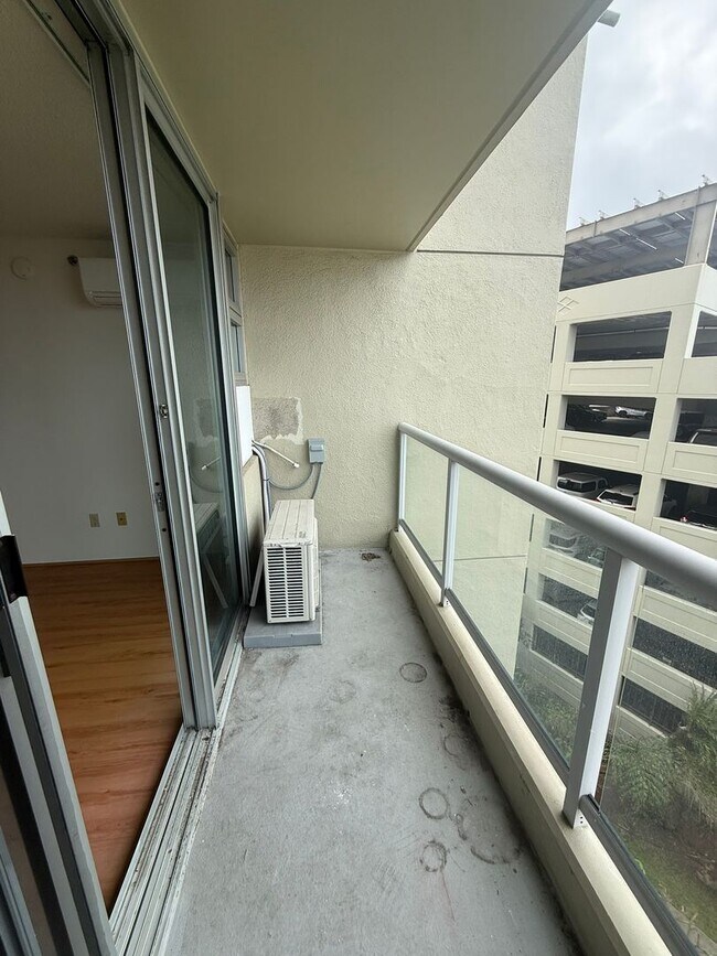 Building Photo - AC in Every Room. TWO Parking Stalls.