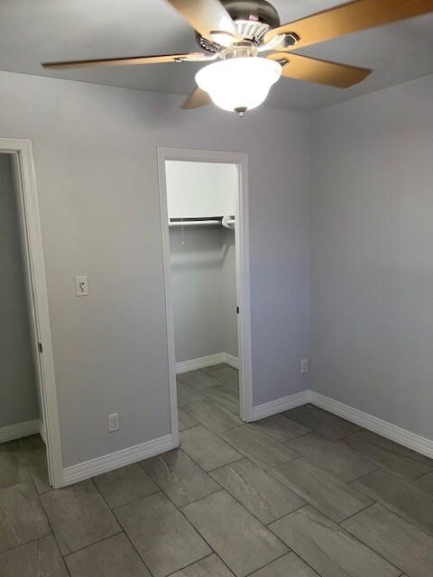 2nd Flr, 2nd Bedroom Walk in Closet, New Tile & Grout Floor, New Baseboards & Molding, Paint - 4444 E Belleview St