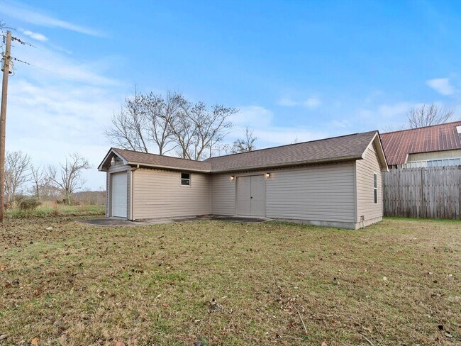 Building Photo - Charming 4-bedroom, 2-bath ranch-style home situated on just over 2 acres!