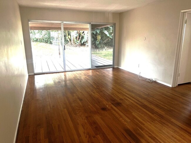 Building Photo - 2BR 1BA Allied Gardens Home - Hardwood Floors, Washer/Dryer, 2 Car Garage, HUGE backyard, 2 Pets ...