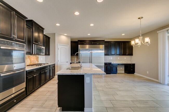 Building Photo - Beautiful Next-Gen Home with Private Entry Suite & Spacious Backyard