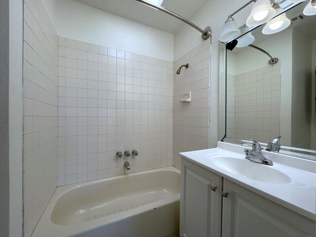 Building Photo - Welcome to this charming two-story single-...