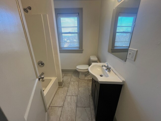 Building Photo - Spacious 4-Bedroom, 2-Bath Home with Porches & Basement