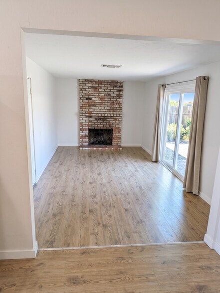 Family Room with access to backyard and patio. - 3006 Campbell Pl