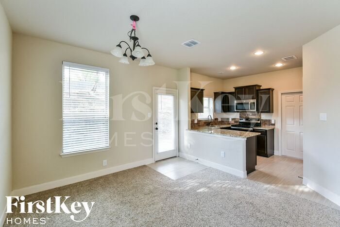 Building Photo - 6518 Woodstock Dr