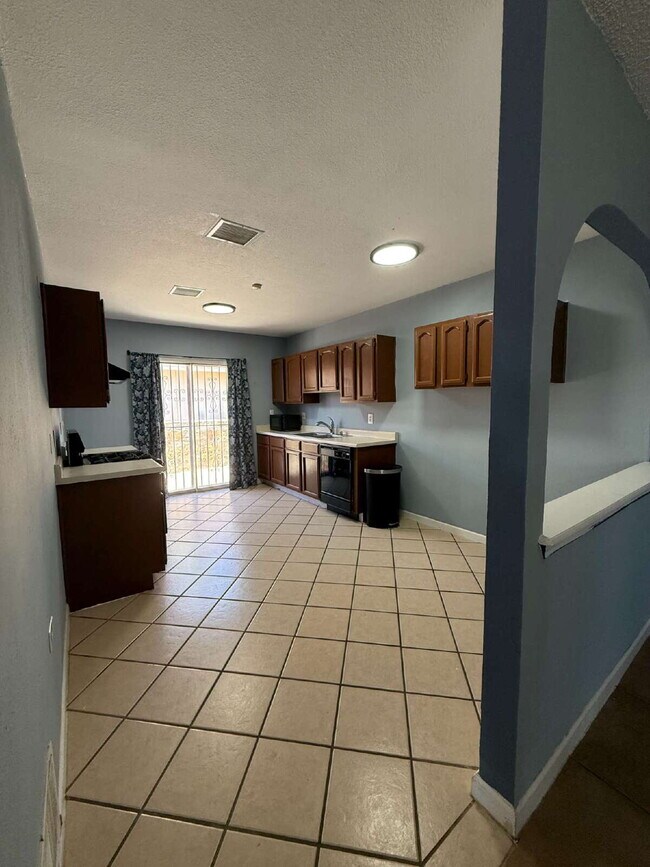 Building Photo - Well, kept three-bedroom, two baths home with Solar Panels. A must see, lease today! 11797 Imperi...