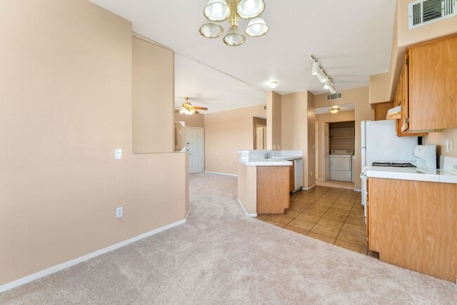 Building Photo - Bright & Stylish Condo with Fireplace and Private Balcony in a Resort-Style Community!