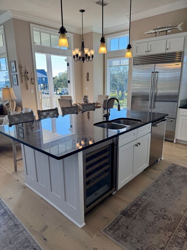 Building Photo - Waterfront Shell Point Home with Dock, Hot Tub, Elevator, & Golf Cart