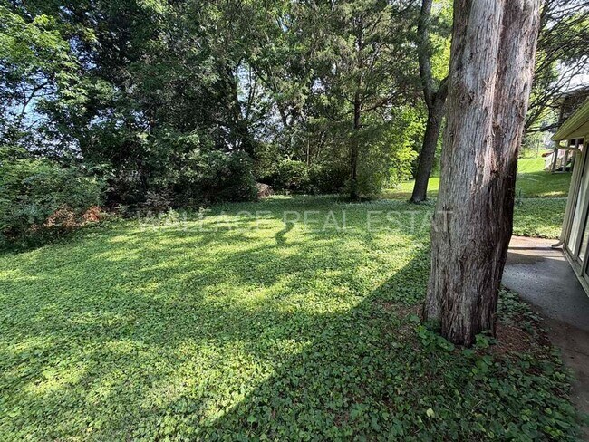 Building Photo - NEW RENTAL RATE...FARRAGUT LIVING OFFERING 4 BEDROOMS AND 3.5 BATHS WITH NICE SUN PORCH
