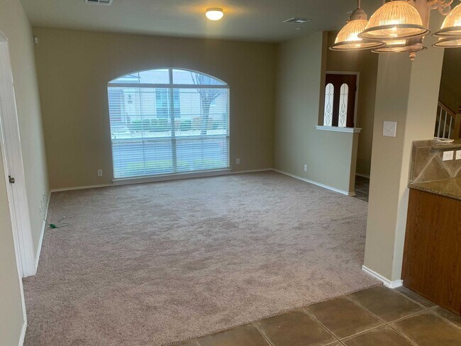 Building Photo - *COMING SOON* Gated Community: 3-Bedroom with Upstairs Loft, Fenced Backyard & Prime Location!