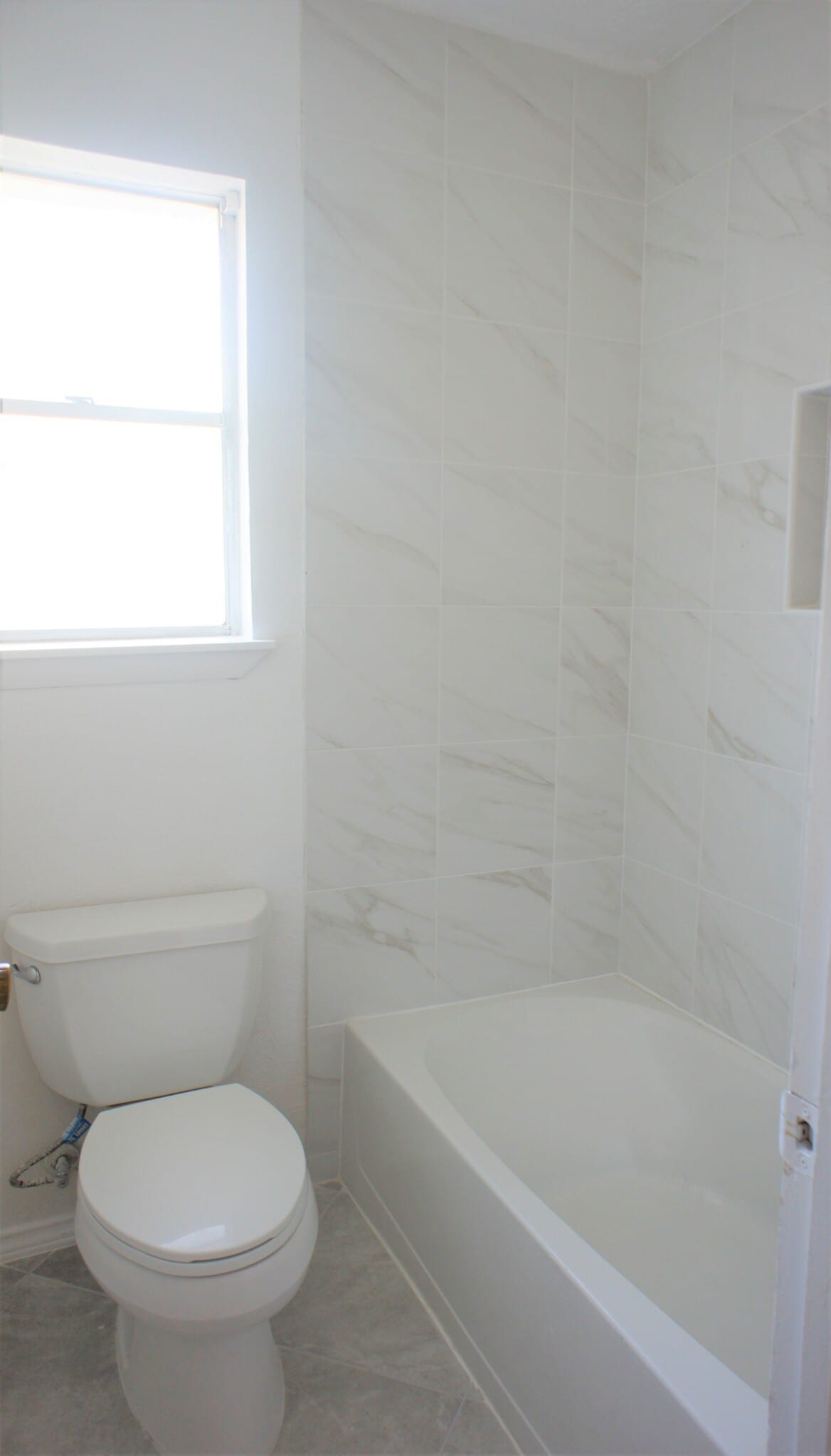 Bath room tile - 14910 Scotter Dr