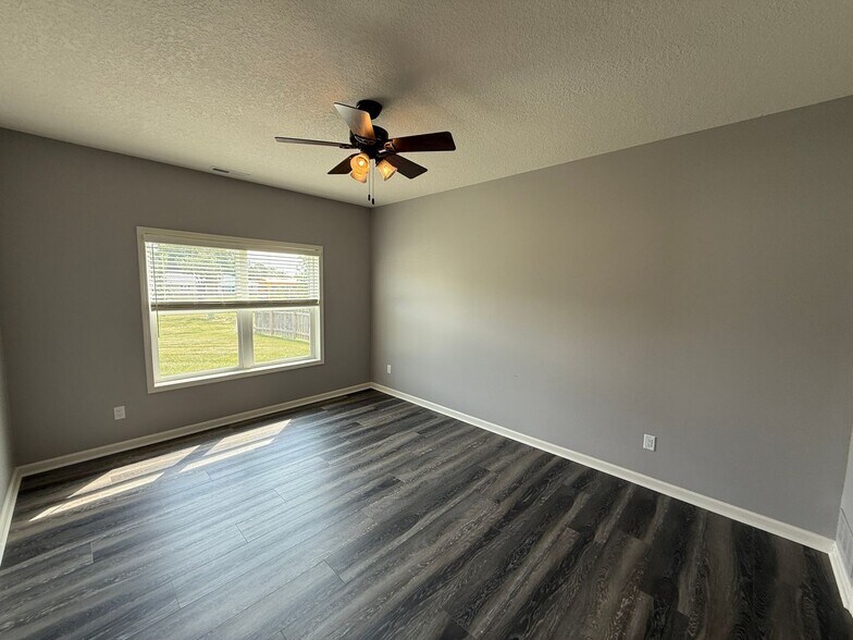 Building Photo - 6015 Melan Cove