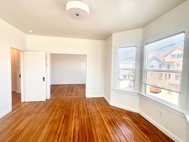 Building Photo - Fully Renovated Bright Corner Apartment wi...
