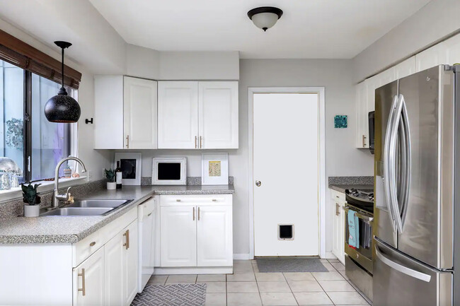 Kitchen and door to garage - 5007 Fort Clark Dr