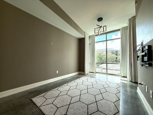 Building Photo - Luxury Midtown 1 Bedroom Condo, Polished Concrete Floors, City Views!