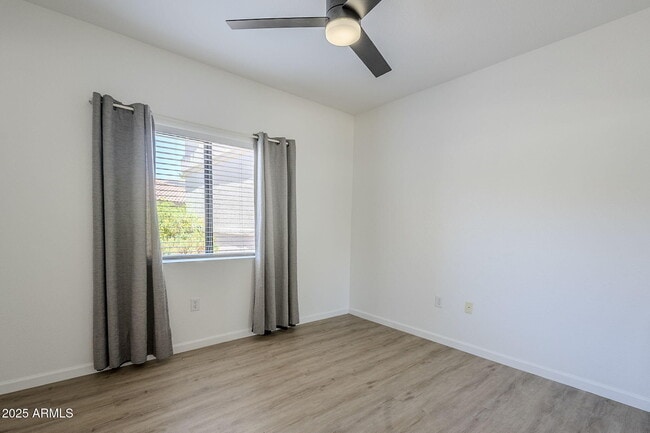 Building Photo - 9455 E Raintree Dr