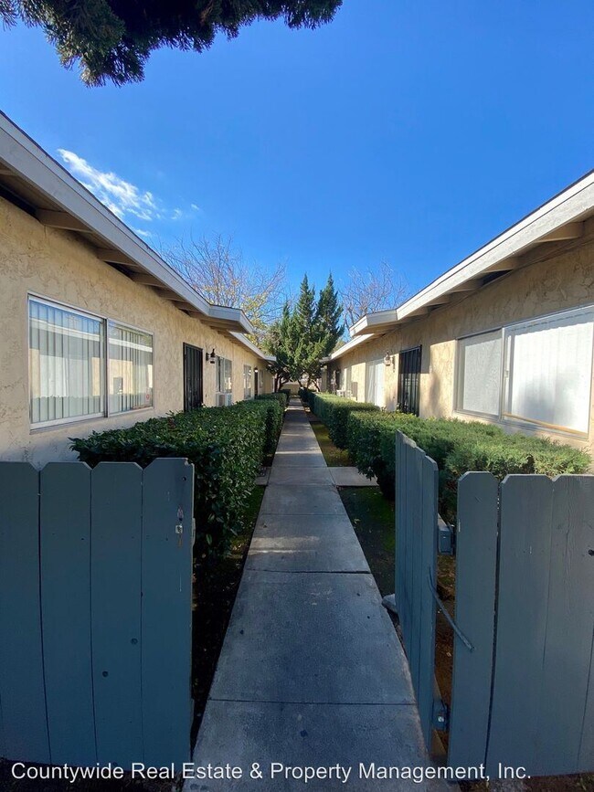 Building Photo - 1100-1154 N Mollison Ave