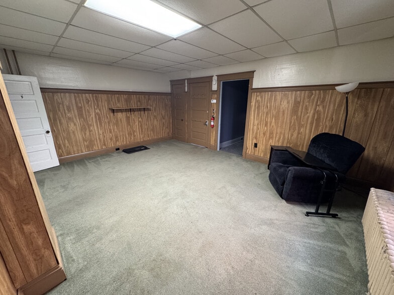 Main living area, view back to bedroom - 216 E Franklin St