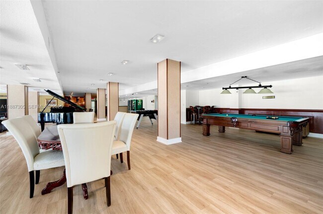 Building Photo - 10185 Collins Ave