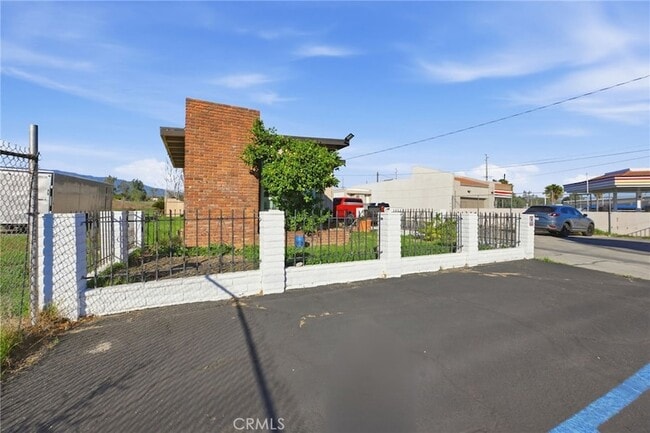 Building Photo - 16072 Arrow Blvd